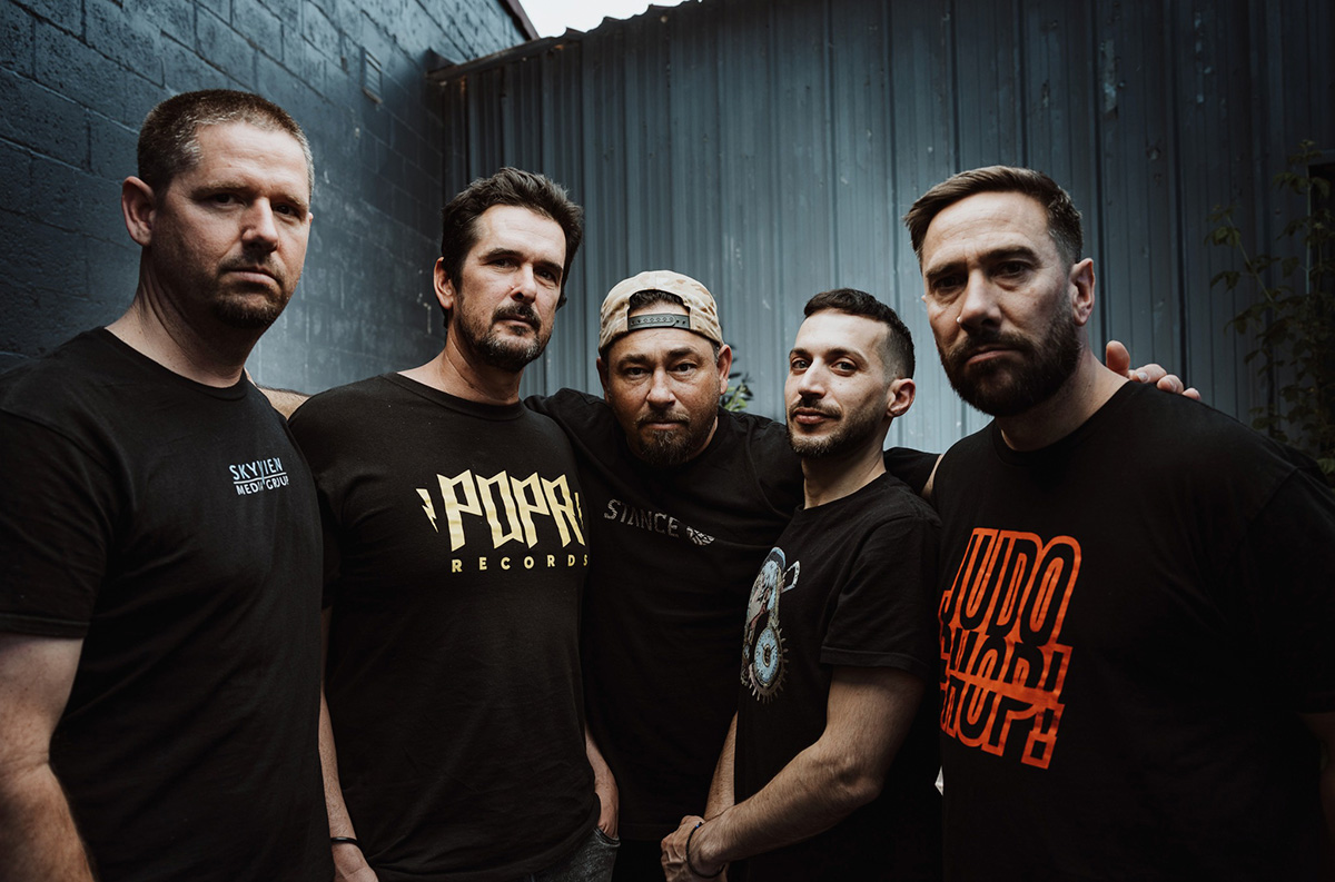 Promo photo of the punk hardcore band Pridebowl standing together outdoors