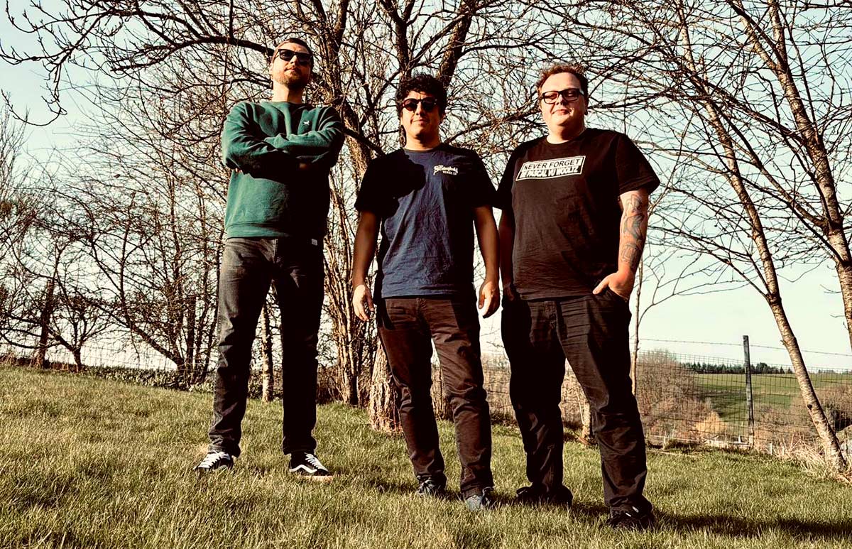 Photo of Weakonstruktion standing outdoors on grass in front of leafless trees